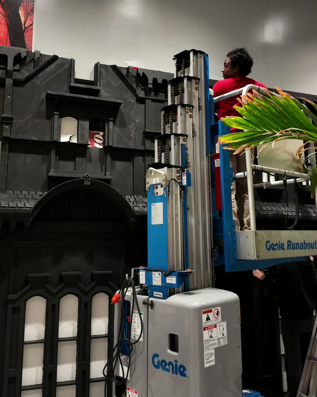 Installing a carved foam facade on site by Fantasy Lab Studios